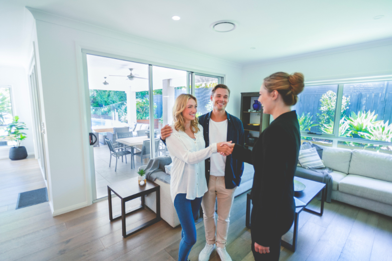 a home buyer shaking hands with real estate agent in Las Vegas