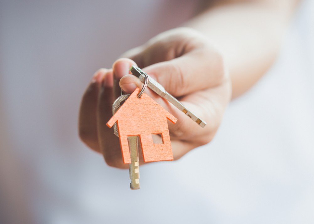 House Key in hand